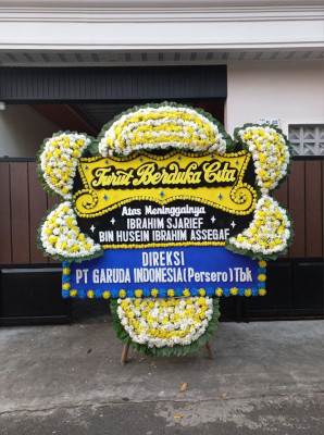Papan Bunga Duka di Topoyo
